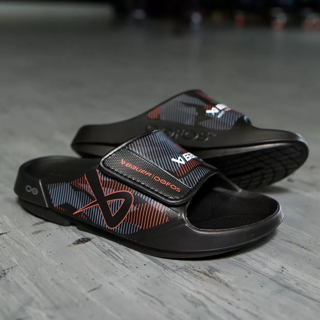 Shop OOFOS NEXT GAME SPORT FLEX SLIDE Hockey Apparel·Oofos Recovery Slides